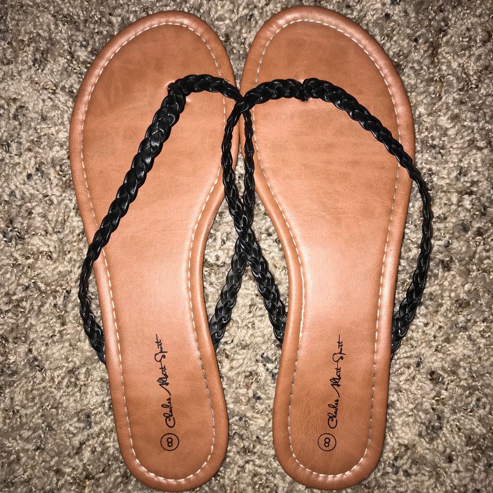 Black strap flip flops